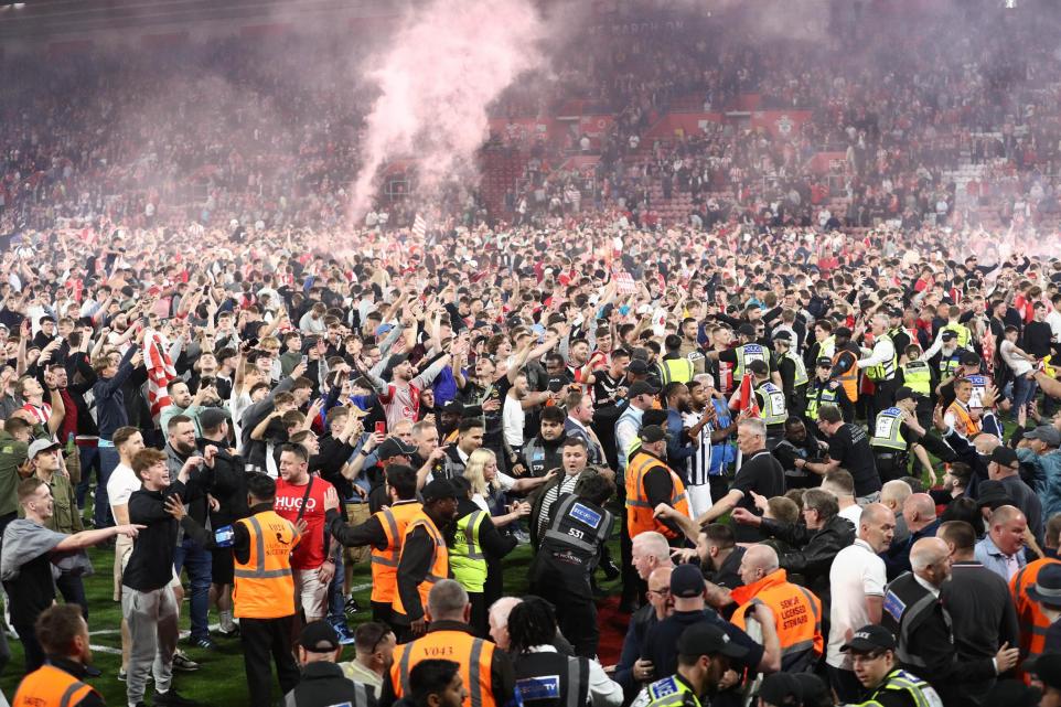 Police release images after Southampton play-off pitch invasion